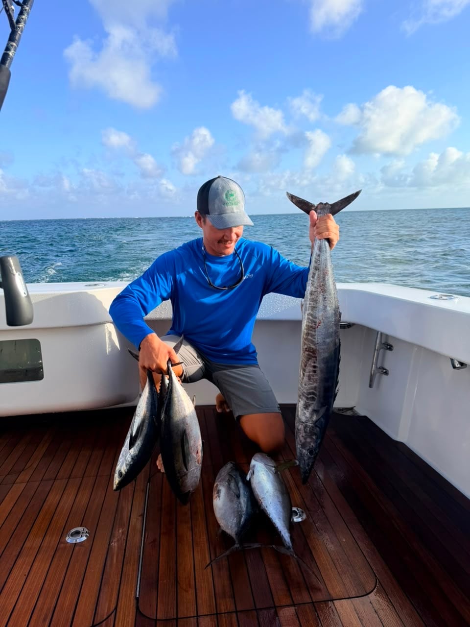 A wahoo and a morning of tuna laid out on the deck